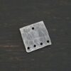 Hammered Square - oxidized 5 holes shown on dark background