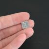 Hammered Square - oxidized 2 holes shown in hand