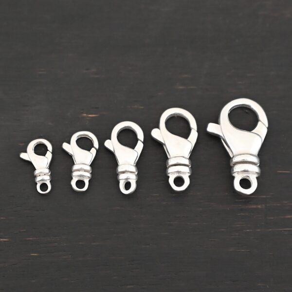 Sammy Swivel Lobster claw clasp - shiny shown on dark background