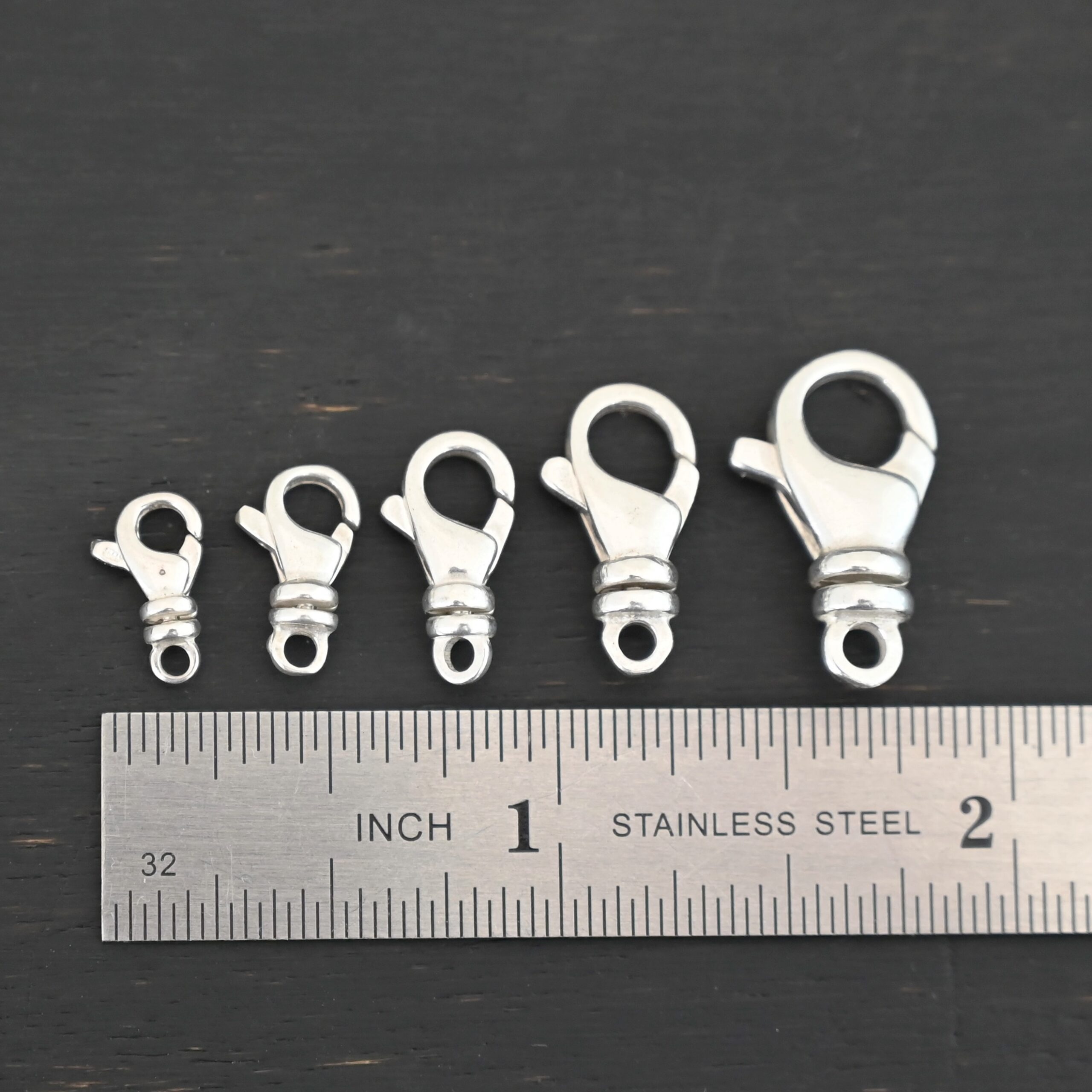 Sammy Swivel Lobster claw clasp - shiny shown by ruler