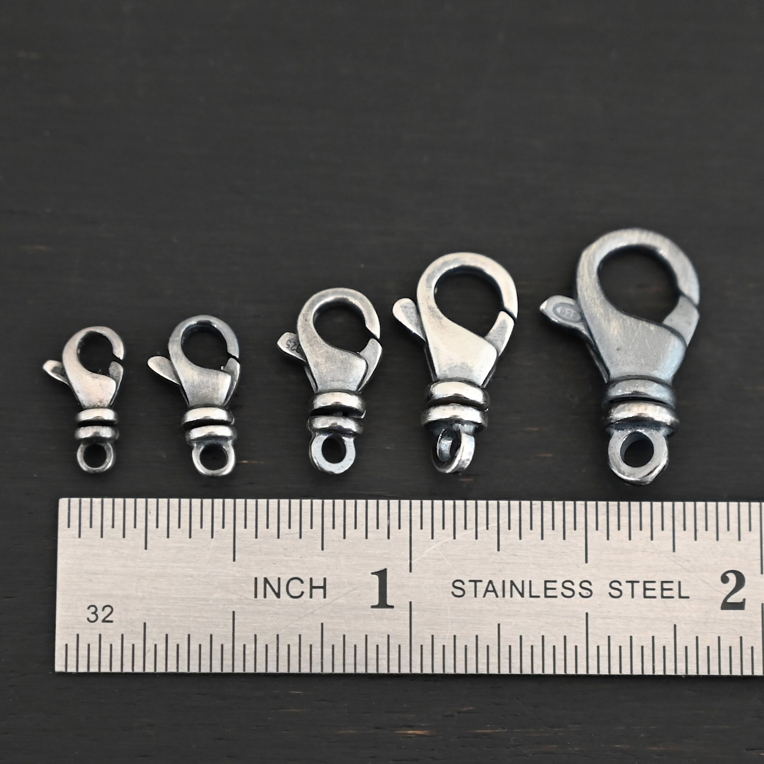Sammy Swivel Lobster claw clasp - oxidized shown by ruler