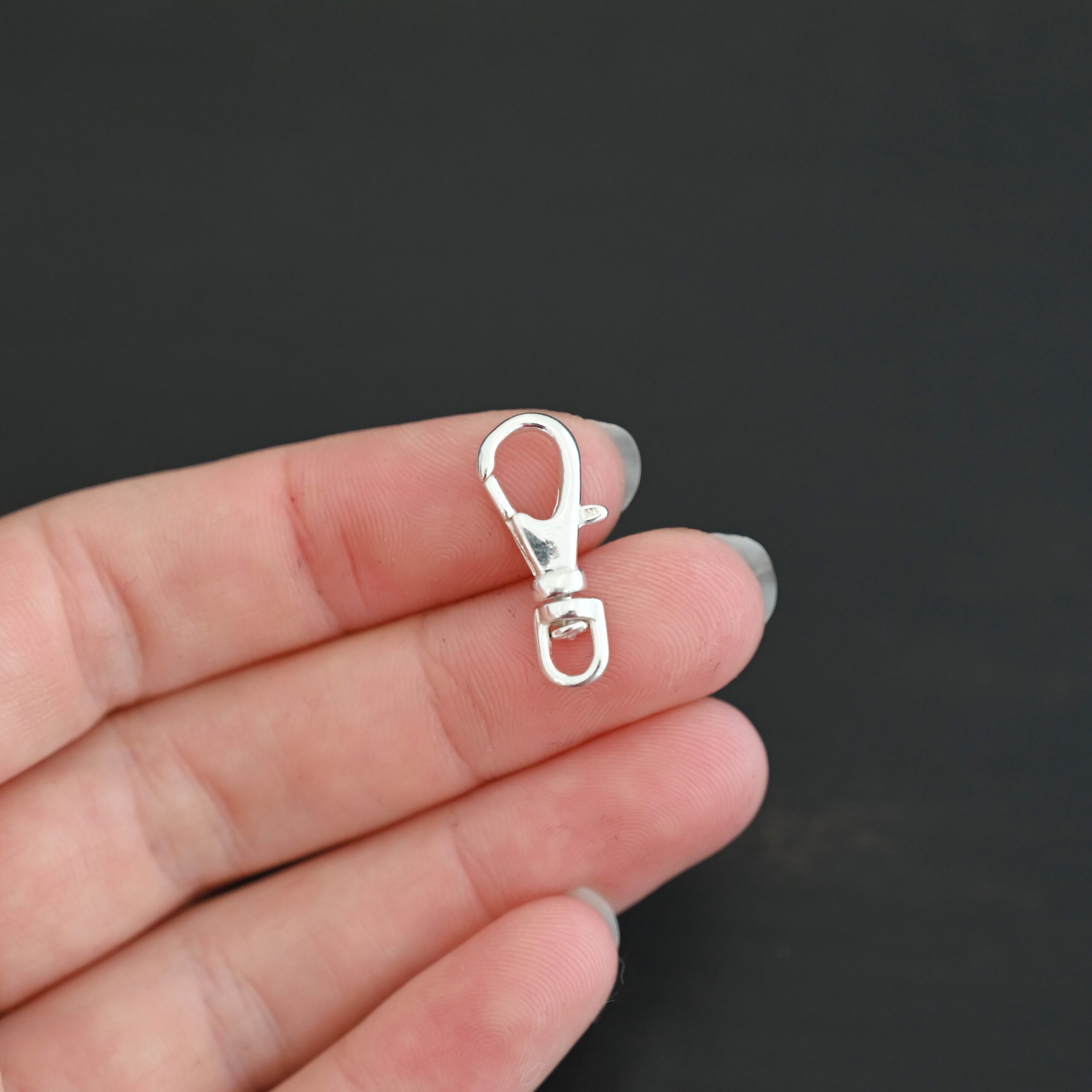 Sofia Swivel Lobster Claw - shiny shown in hand