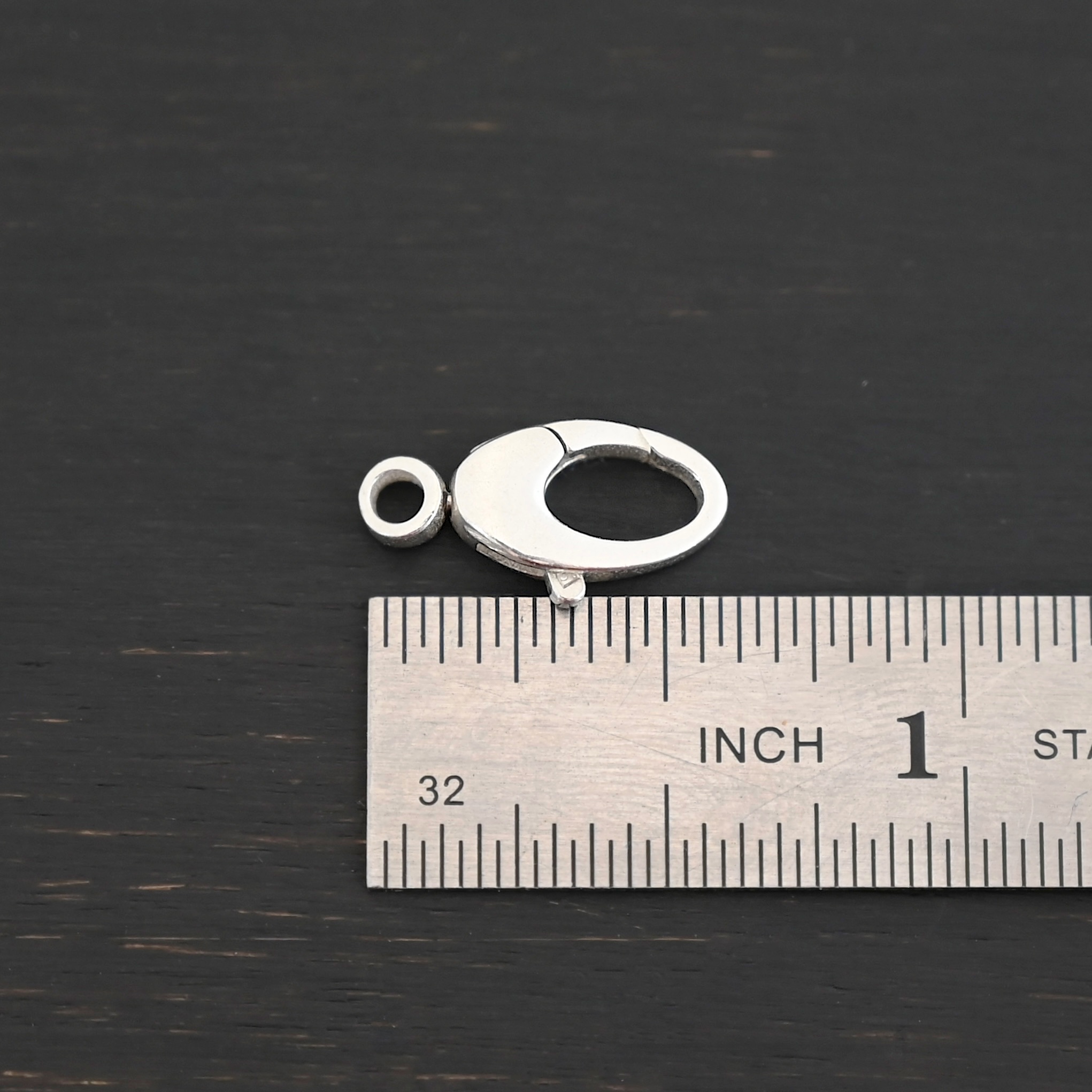 Sunny Swivel Lobster Claw clasp - shiny Sunny Swivel Lobster Claw clasp - shiny shown by ruler