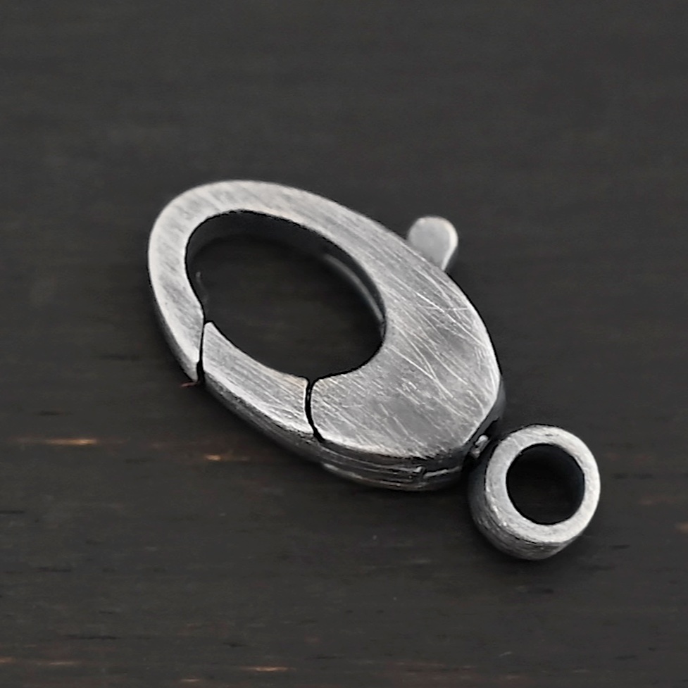 Sunny Swivel Lobster Claw clasp - oxidized Sunny Swivel Lobster Claw clasp - oxidized shown on dark background