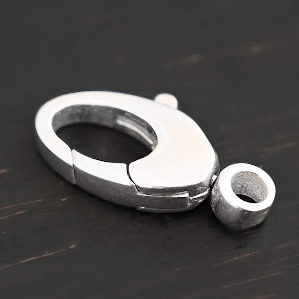 Sunny Swivel Lobster Claw clasp - shiny Sunny Swivel Lobster Claw clasp - shiny shown on dark background