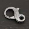 Faith Figure 8 Lobster Claw - oxidized shown on dark background