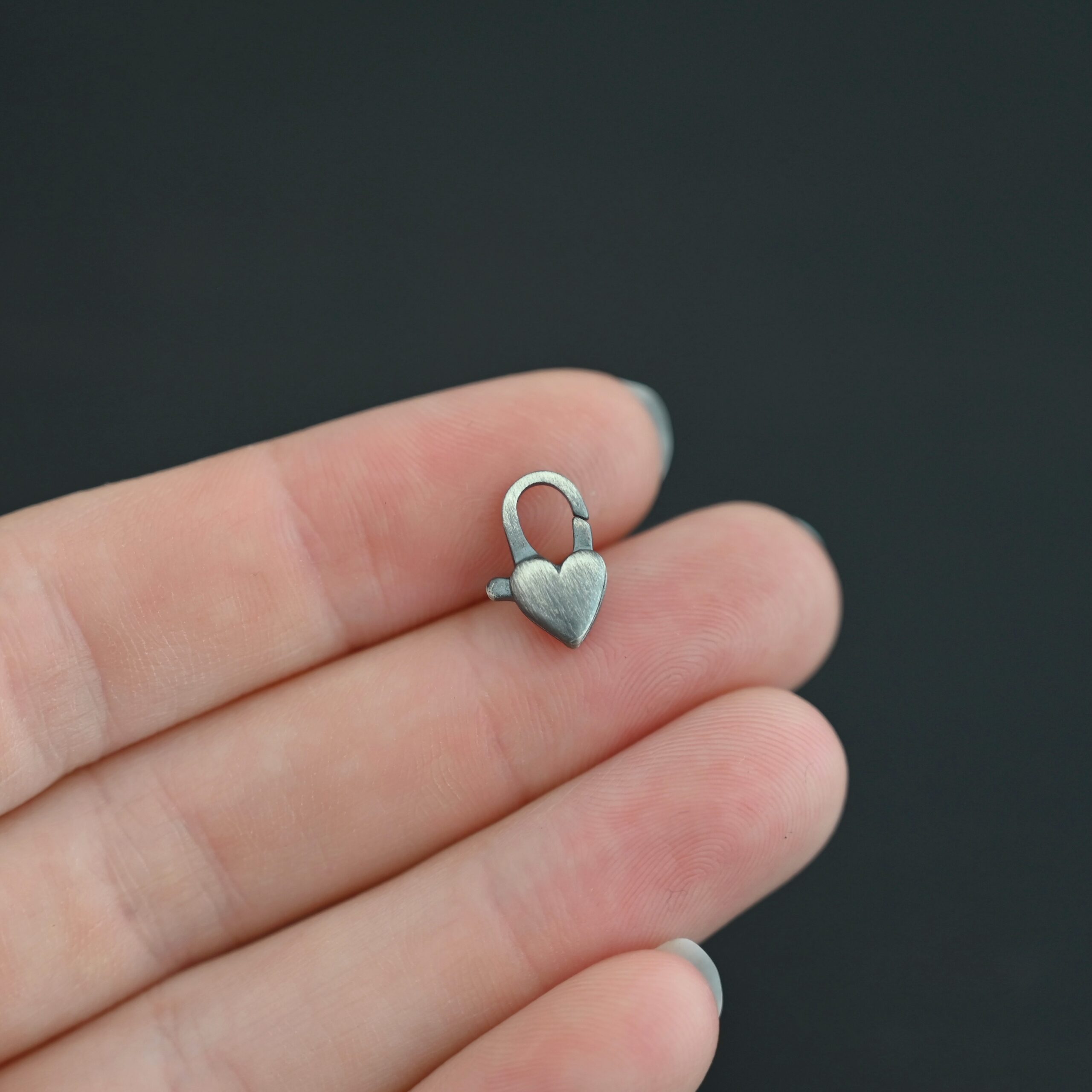 Harper Heart Lobster - oxidized shown in hand