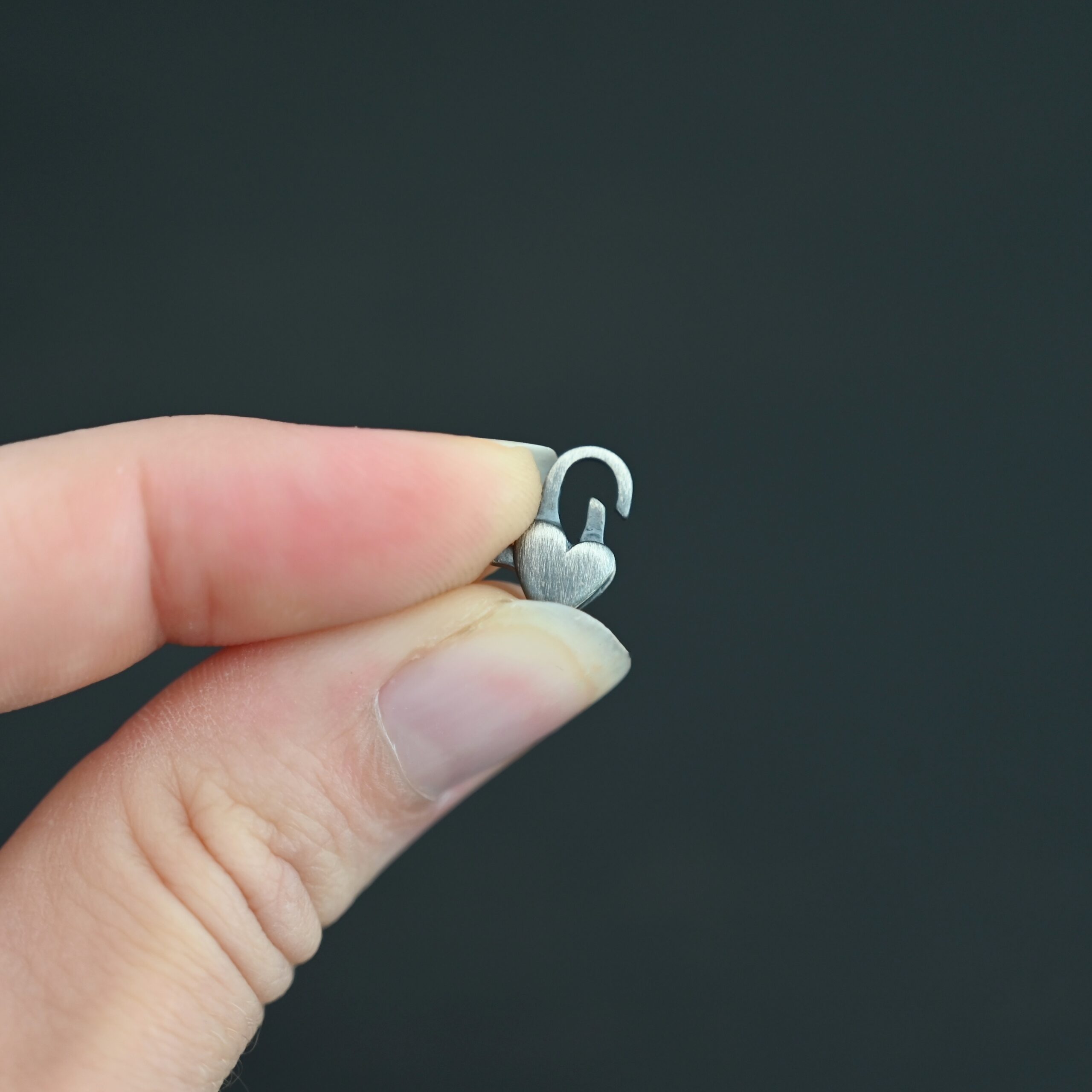 Harper Heart Lobster - oxidized shown in hand