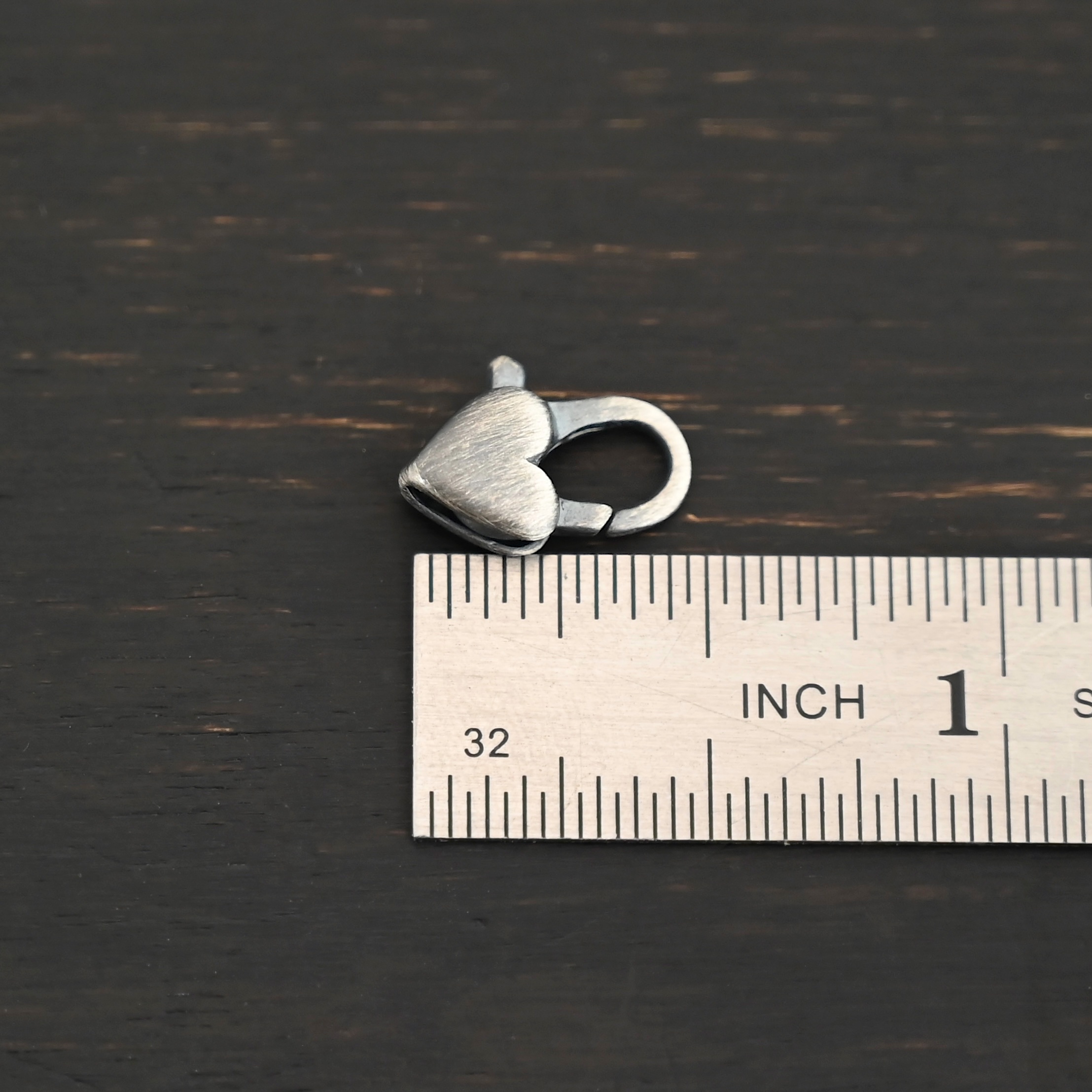 Harper Heart Lobster - oxidized shown by ruler