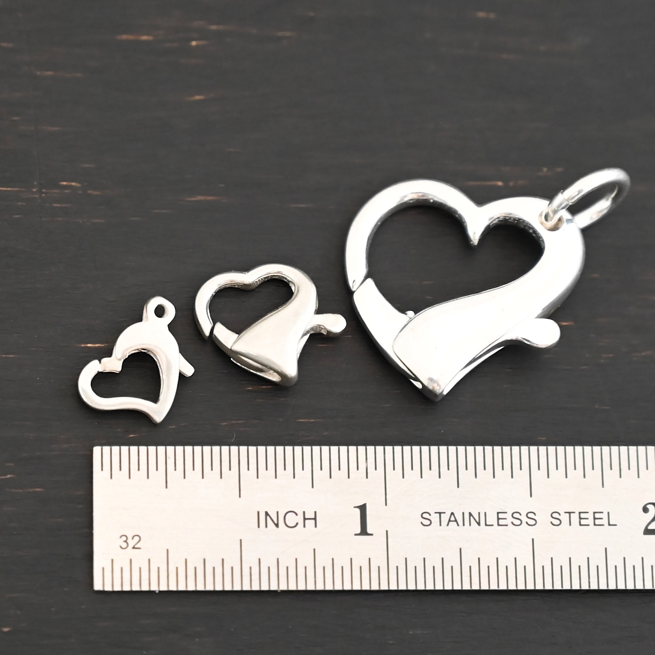 Hallie Heart Lobster Claw - shiny shown by ruler