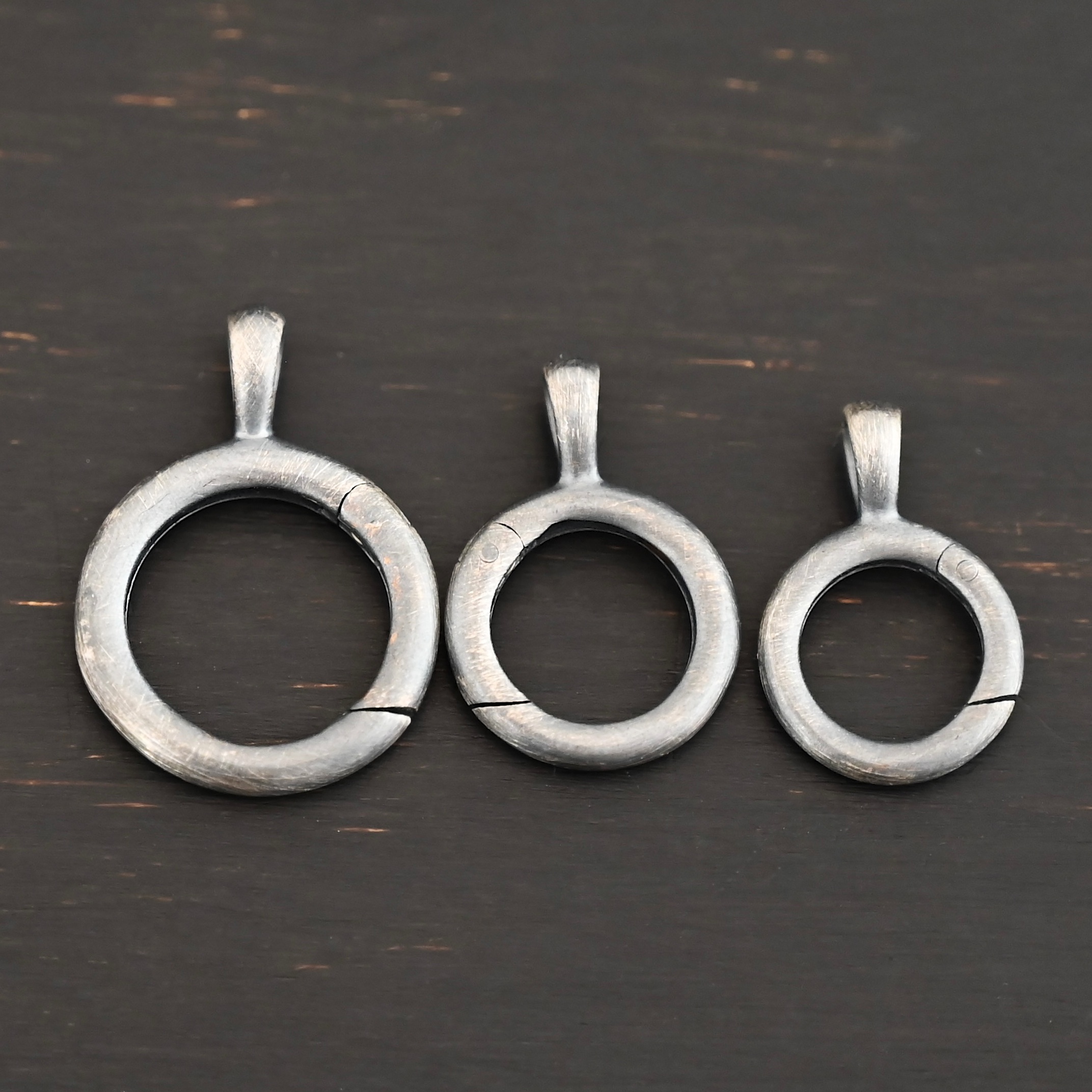 Piper Pendant Holder - oxidized shown on dark background