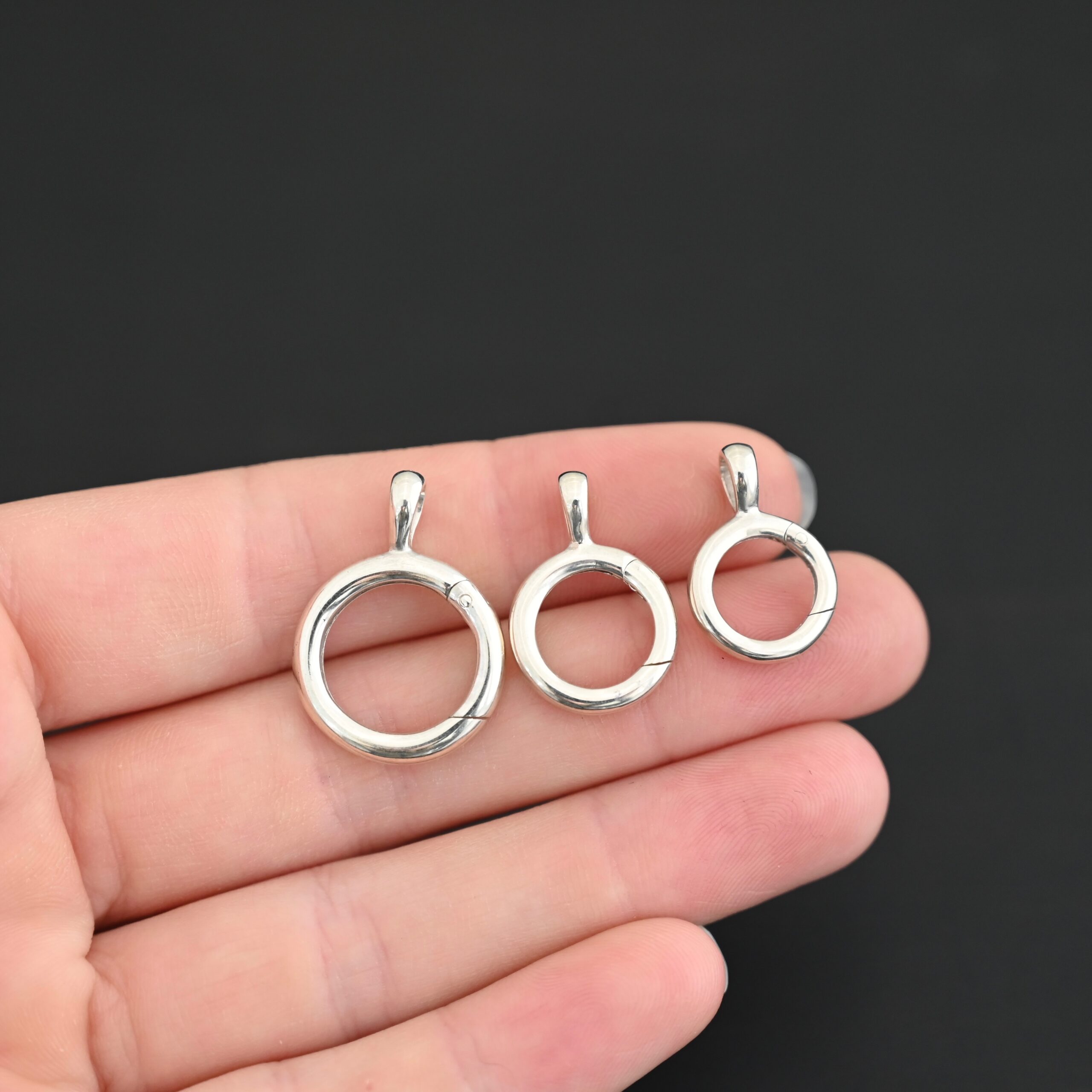 Piper Pendant Holder - shiny shown in hand