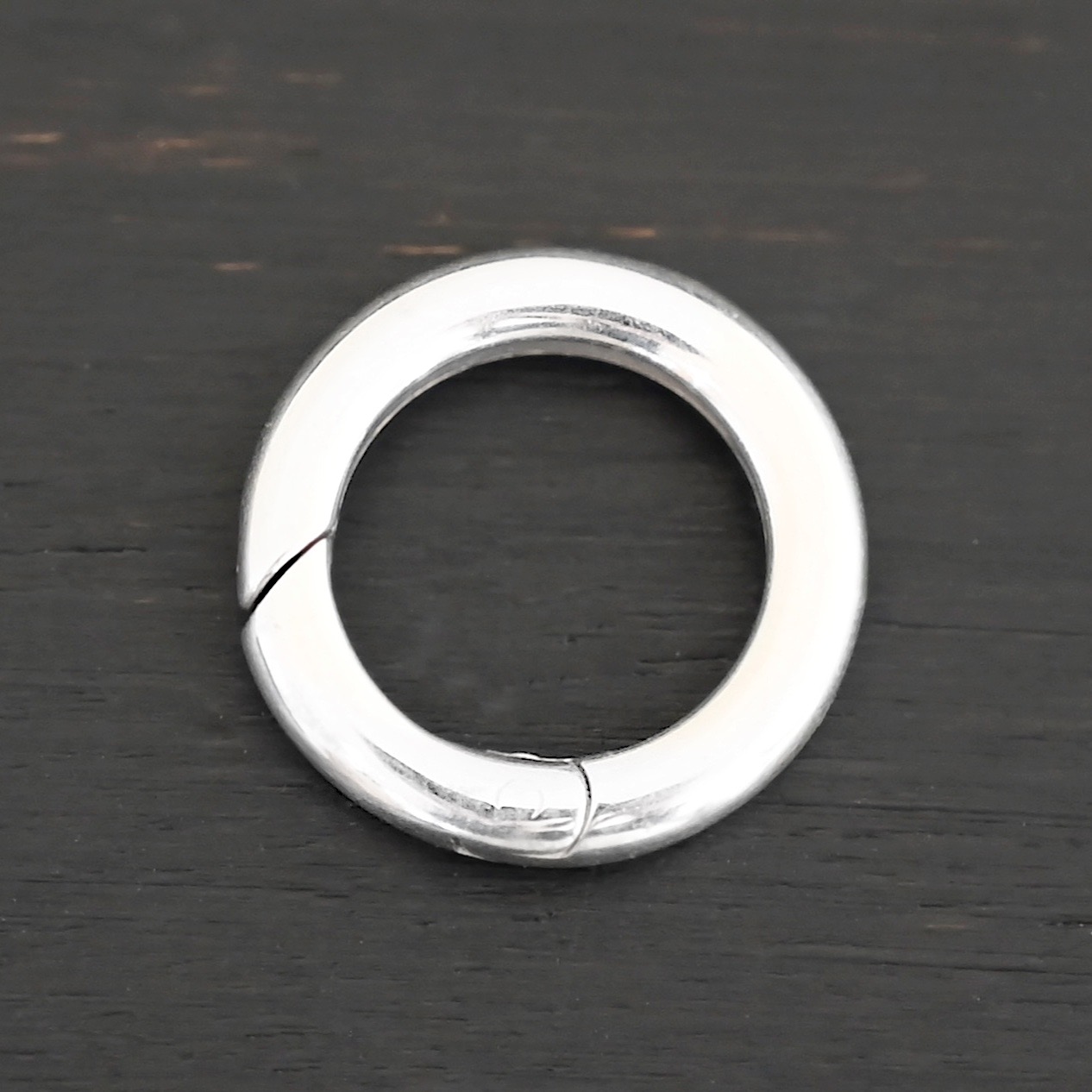 Penny Push Clasp - shiny shown on dark background