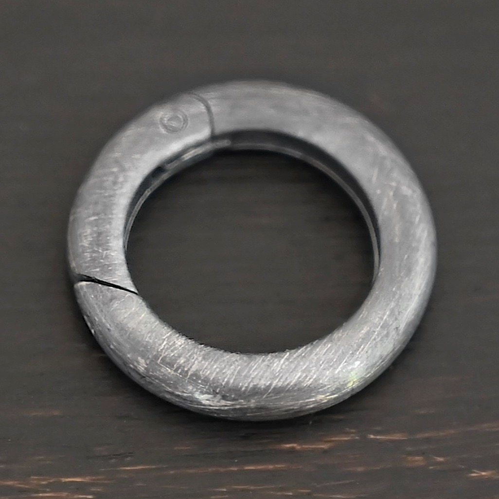 Penny Push Clasp - oxidized shown on dark background