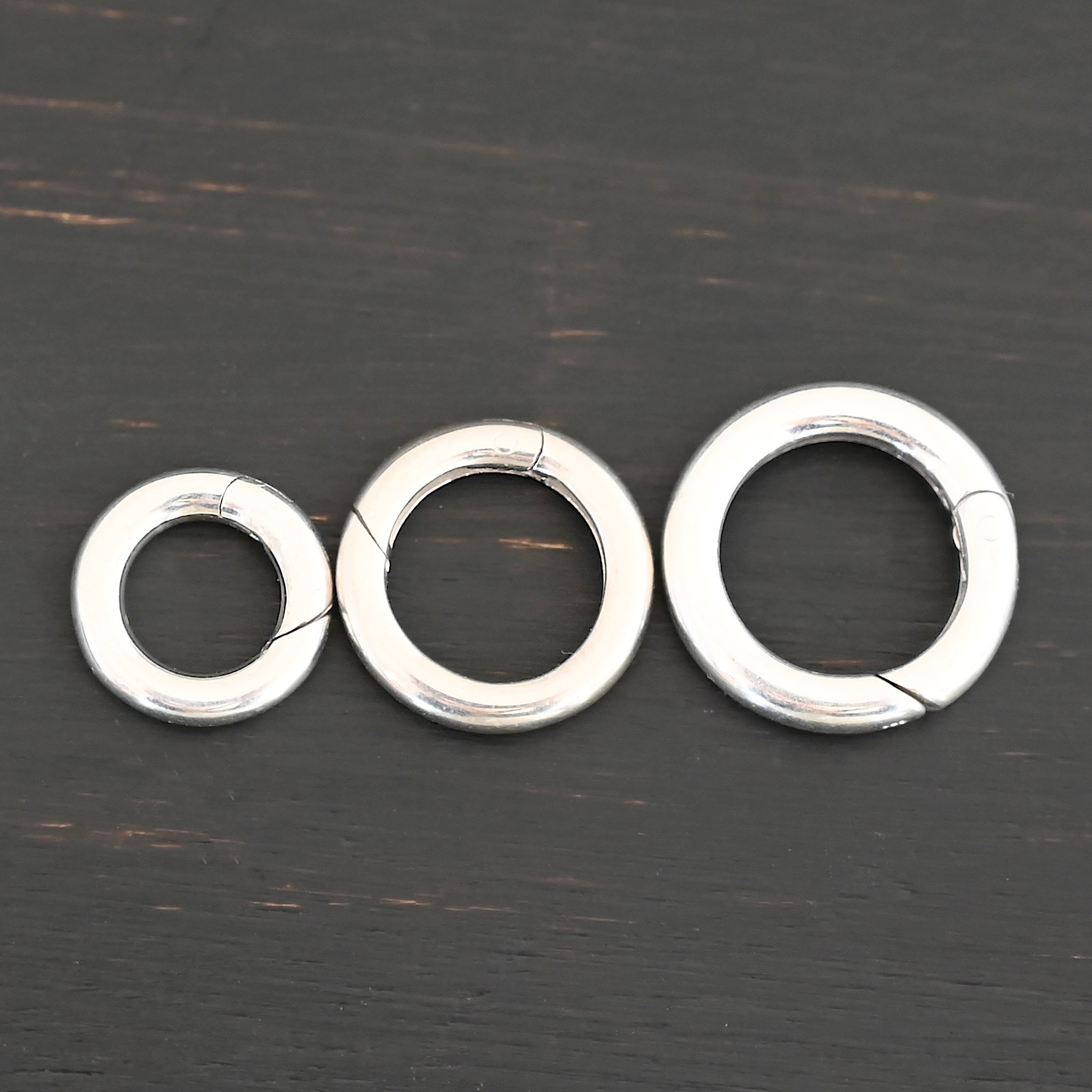 Piper Push Clasp - oxidized shown on dark background