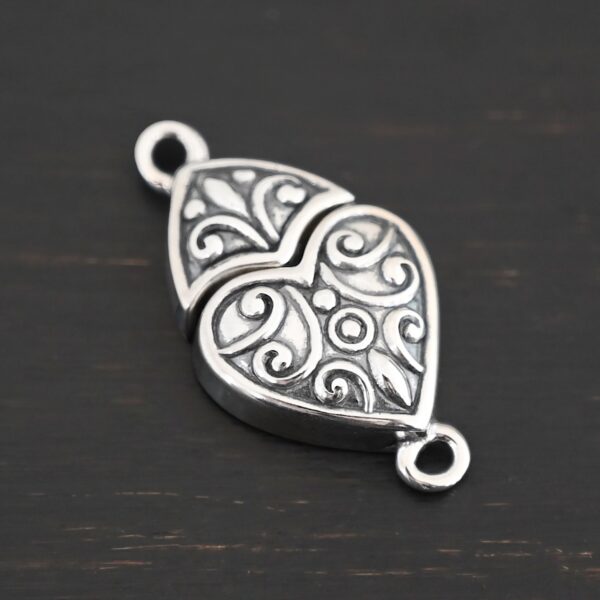 Magnetic Heart Clasp shown on dark background
