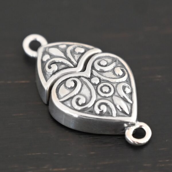 Magnetic Heart Clasp shown on dark background