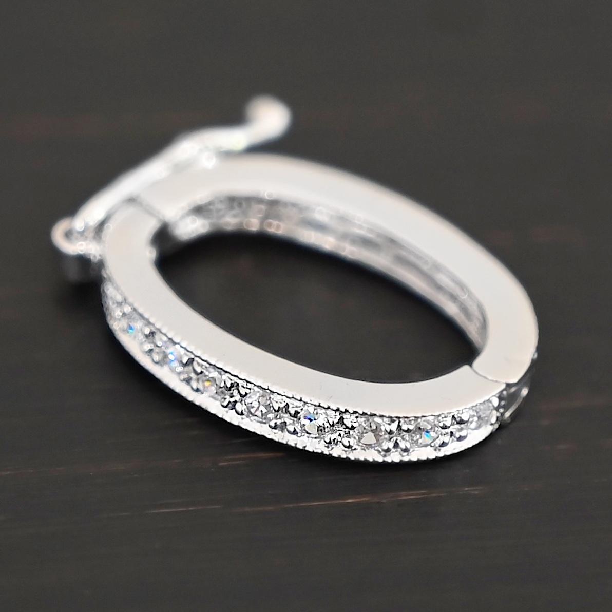 Ellie CZ Enhancer clasp shown on dark background