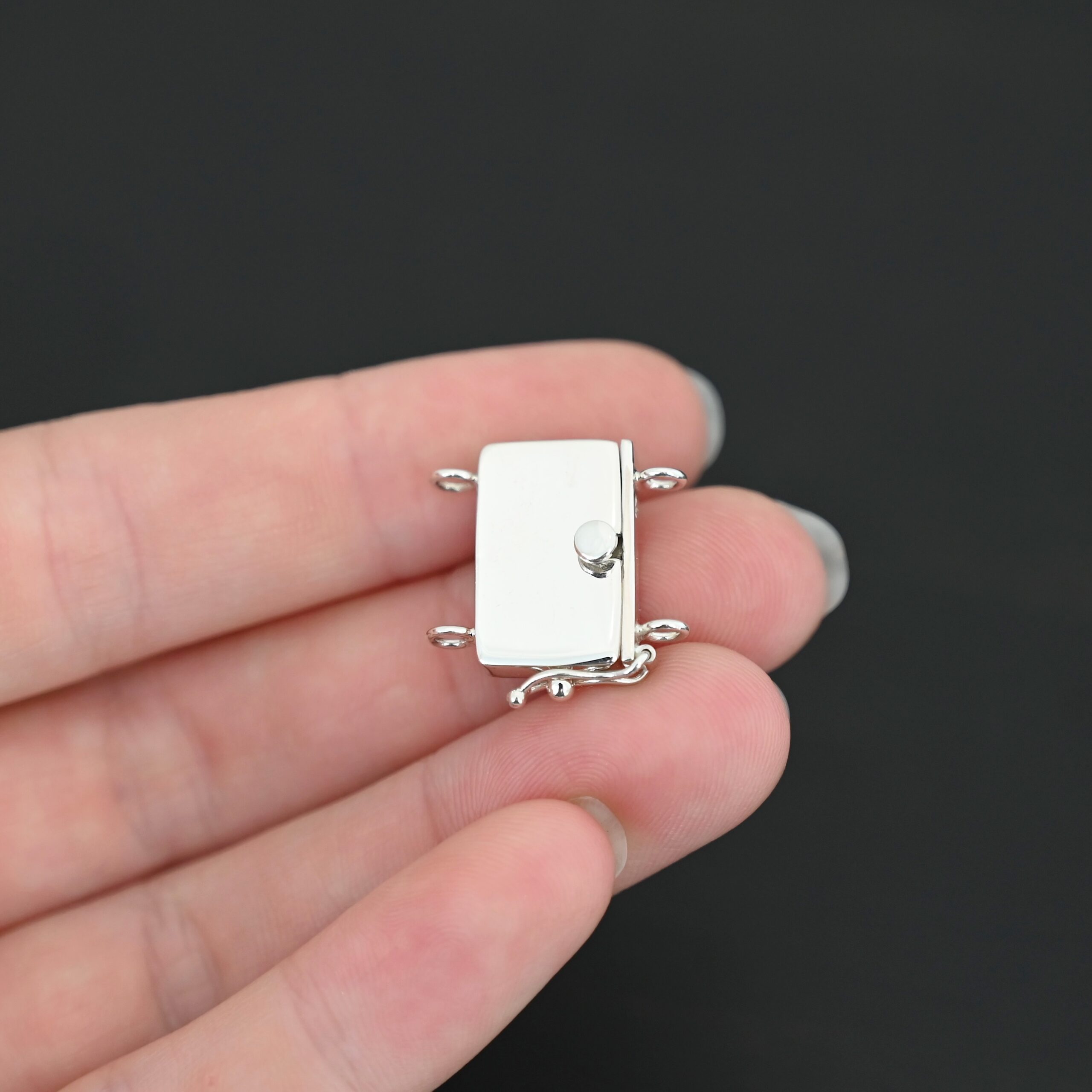 Box Clasp - shiny shown in hand