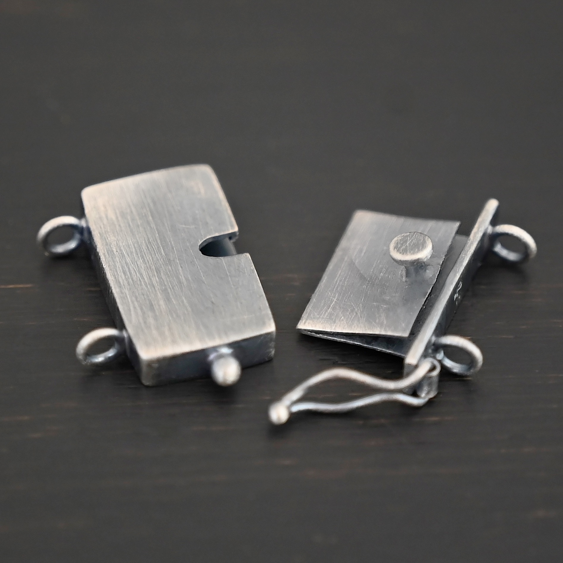 Box Clasp - oxidized shown on dark background
