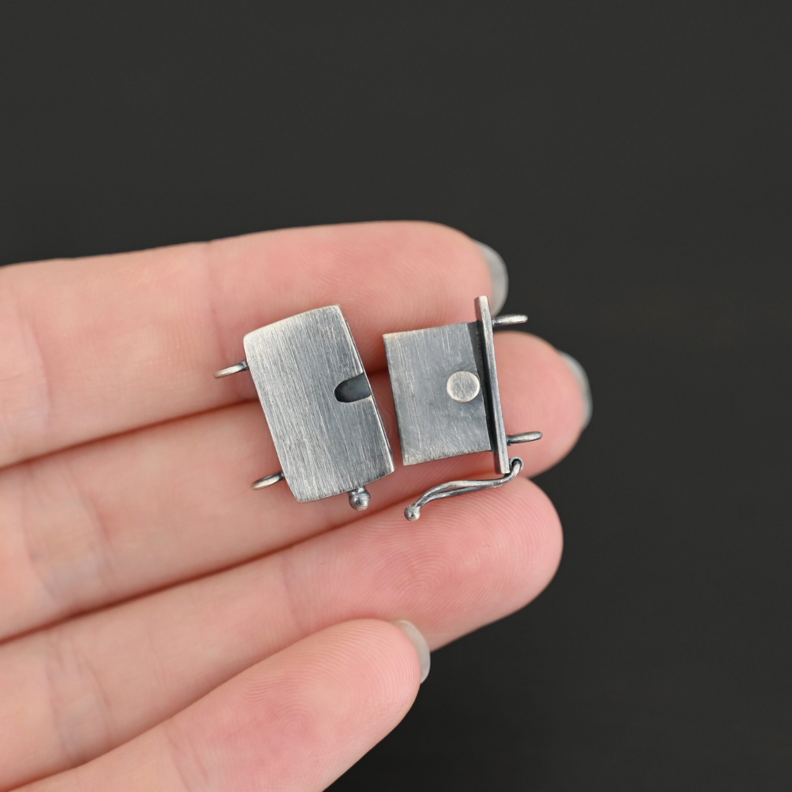 Box Clasp - oxidized shown in hand