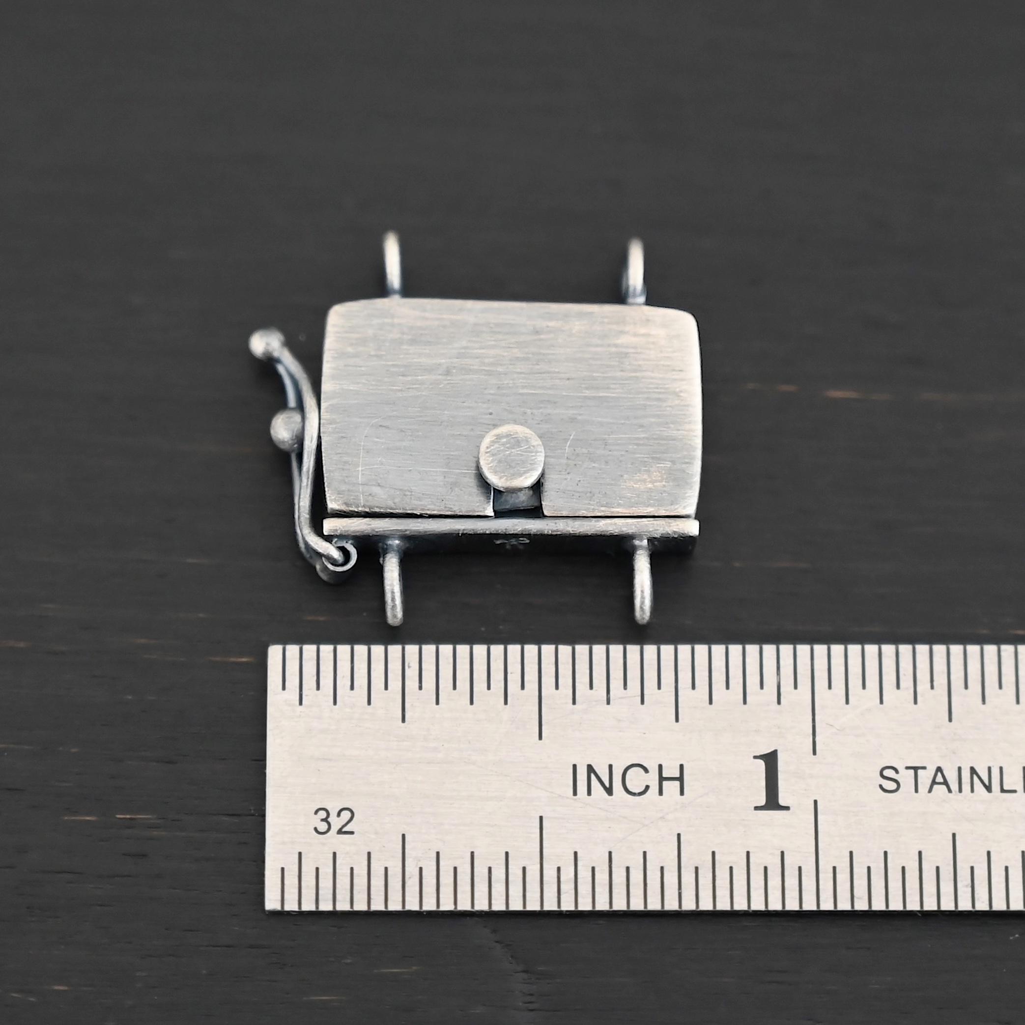 Box Clasp - oxidized shown by ruler