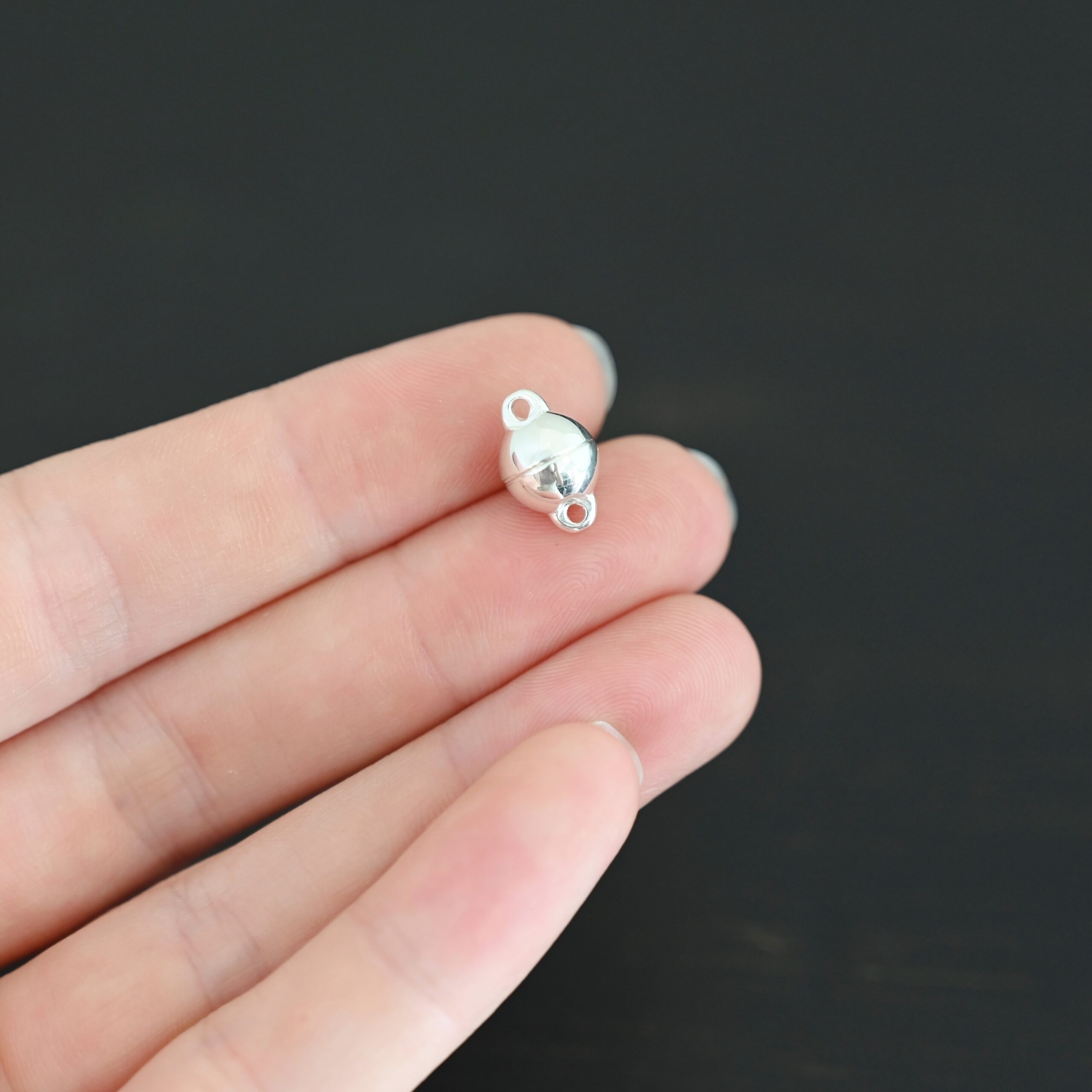 Melody Round Magnetic Clasp - shiny shown in hand