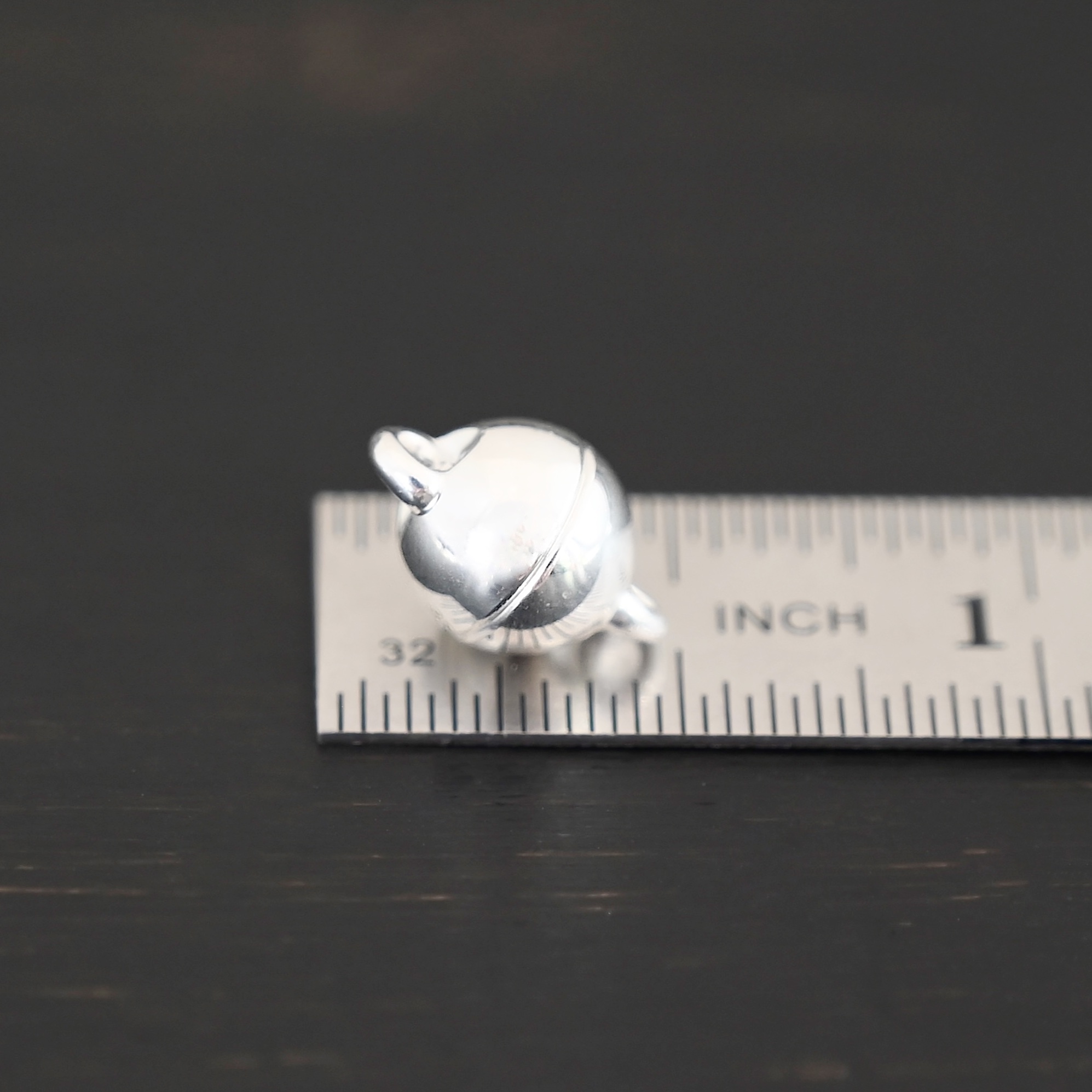 Melody Round Magnetic Clasp - shiny shown by ruler