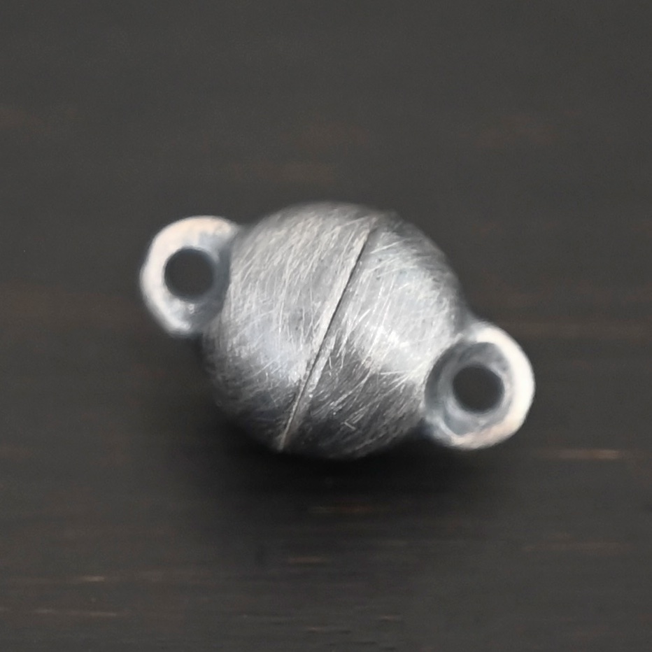 Melody Round Magnetic Clasp - oxidized shown on dark background