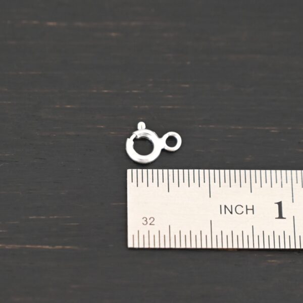 Sky Spring Ring Clasps - shiny shown by ruler