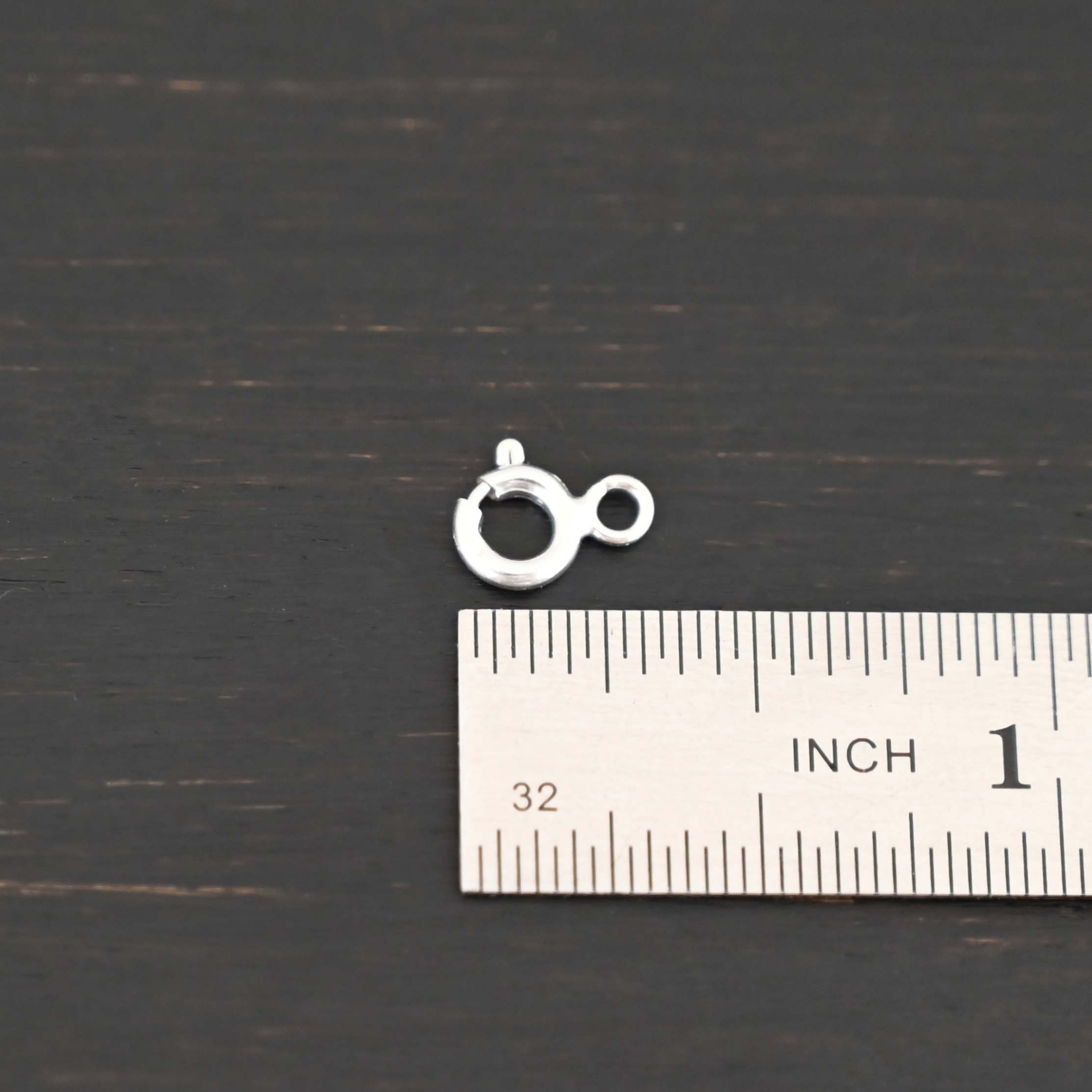 Sky Spring Ring Clasps - shiny shown by ruler