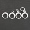 Pearl Push Clasp - small shiny shown on dark background