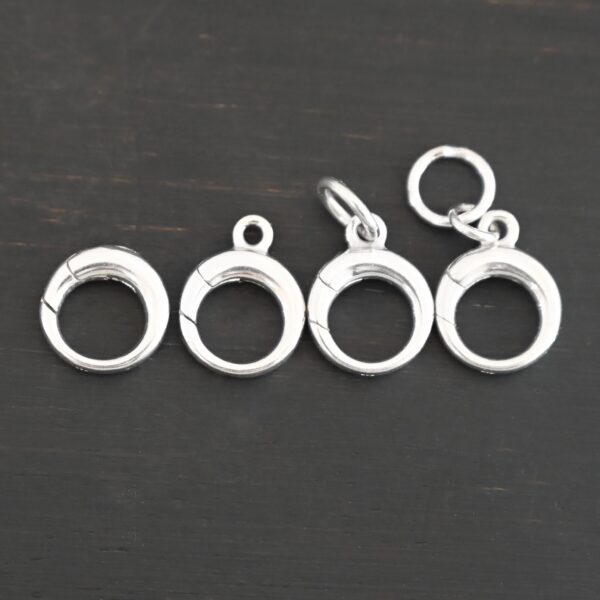 Pearl Push Clasp - small shiny shown on dark background