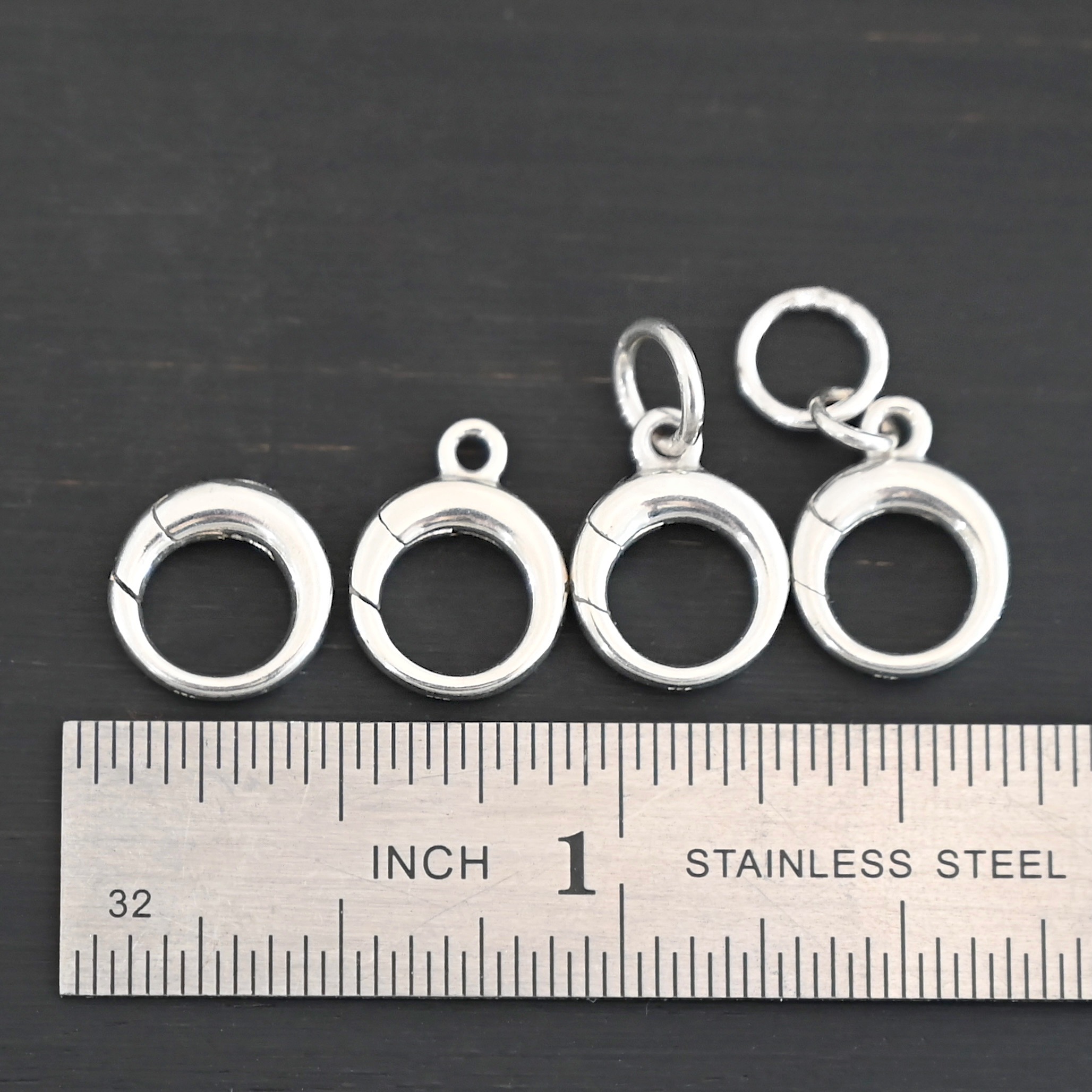 Pearl Push Clasp - small shiny shown by ruler