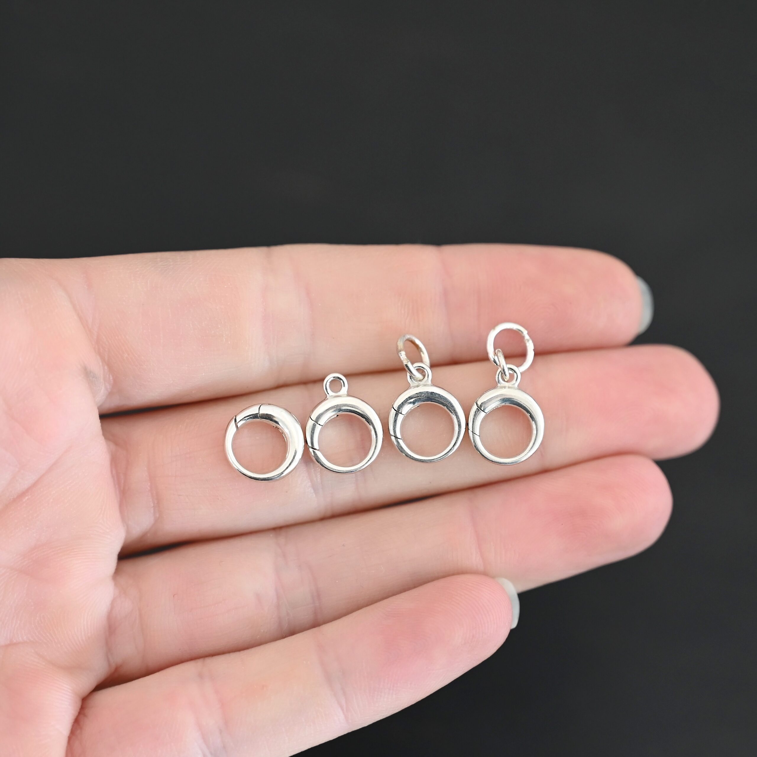 Pearl Push Clasp - small shiny shown in hand