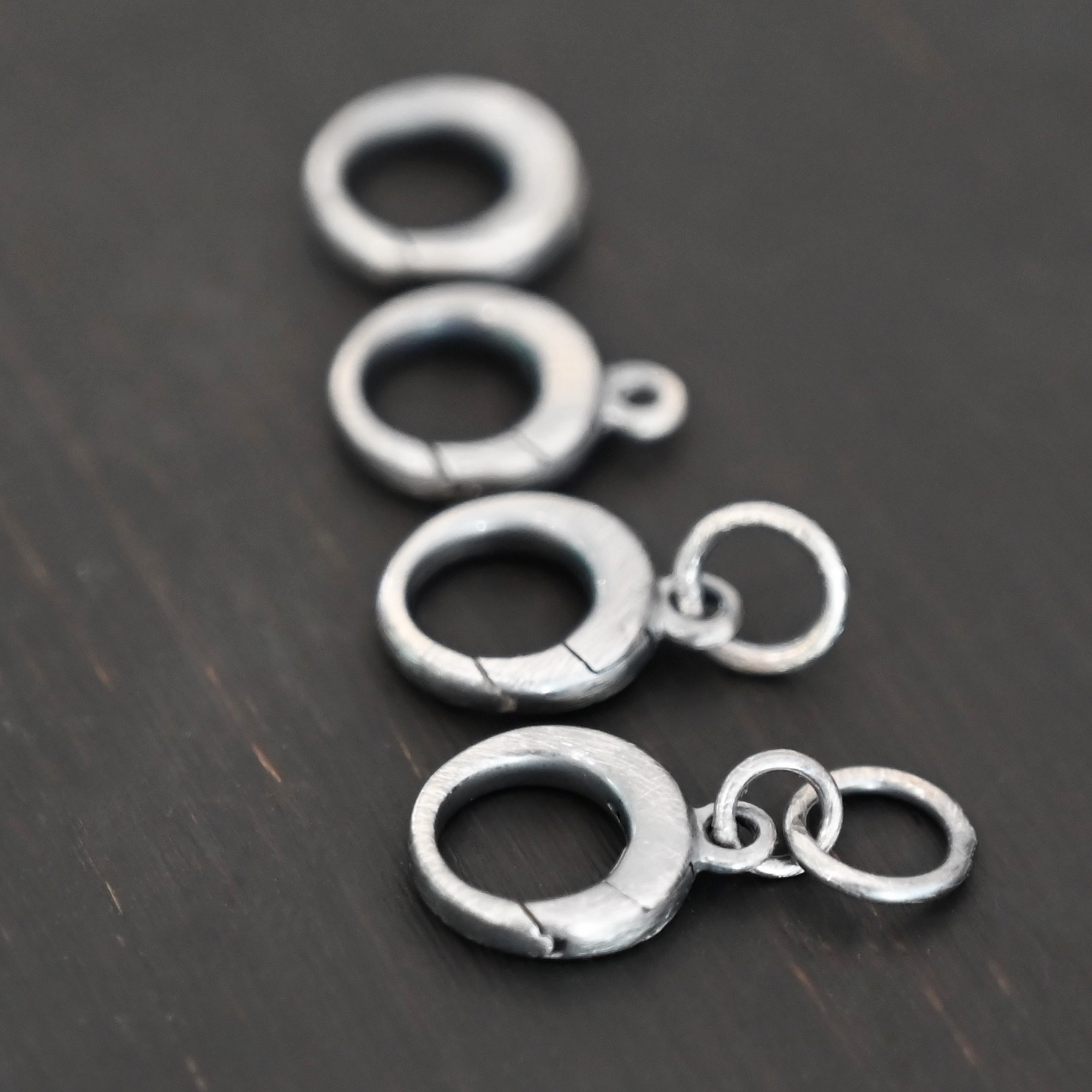 Pearl Push Clasp - small oxidized shown on dark background