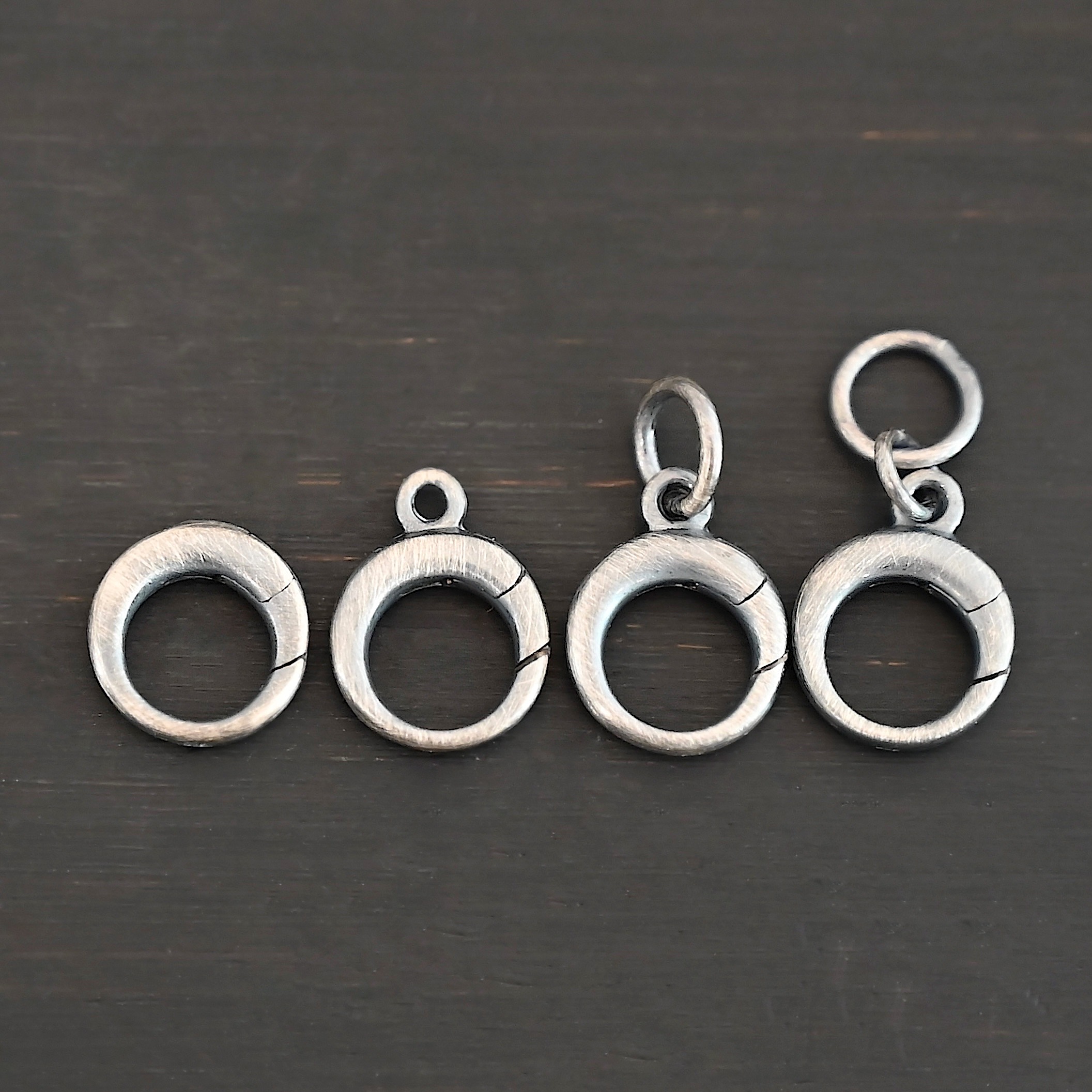 Pearl Push Clasp - small oxidized shown on dark background