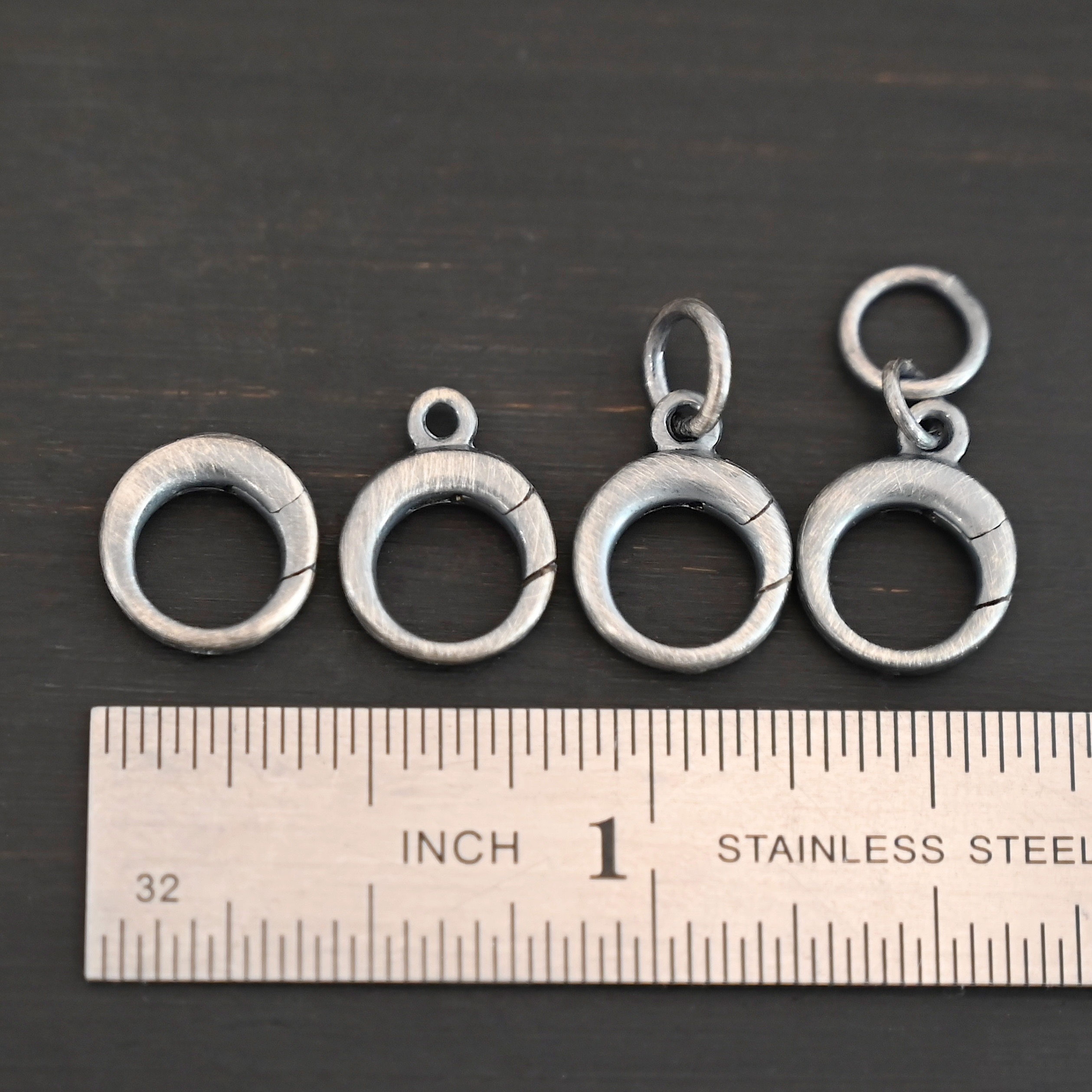Pearl Push Clasp - small oxidized shown by ruler