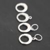 Pearl Push Clasp - large shiny shown on dark background
