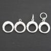 Pearl Push Clasp - large shiny shown on dark background