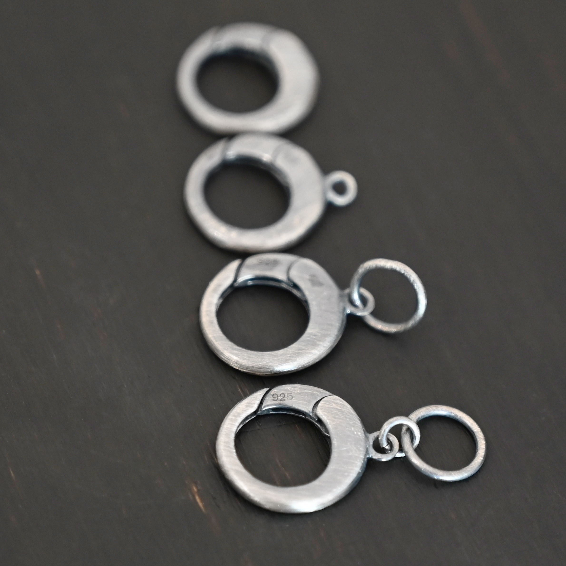 Pearl Push Clasp - large oxidized shown on dark background