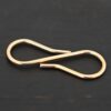 Stella 14k GF S Clasp shown on dark background