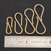 Stella 14k GF S Clasp shown by ruler