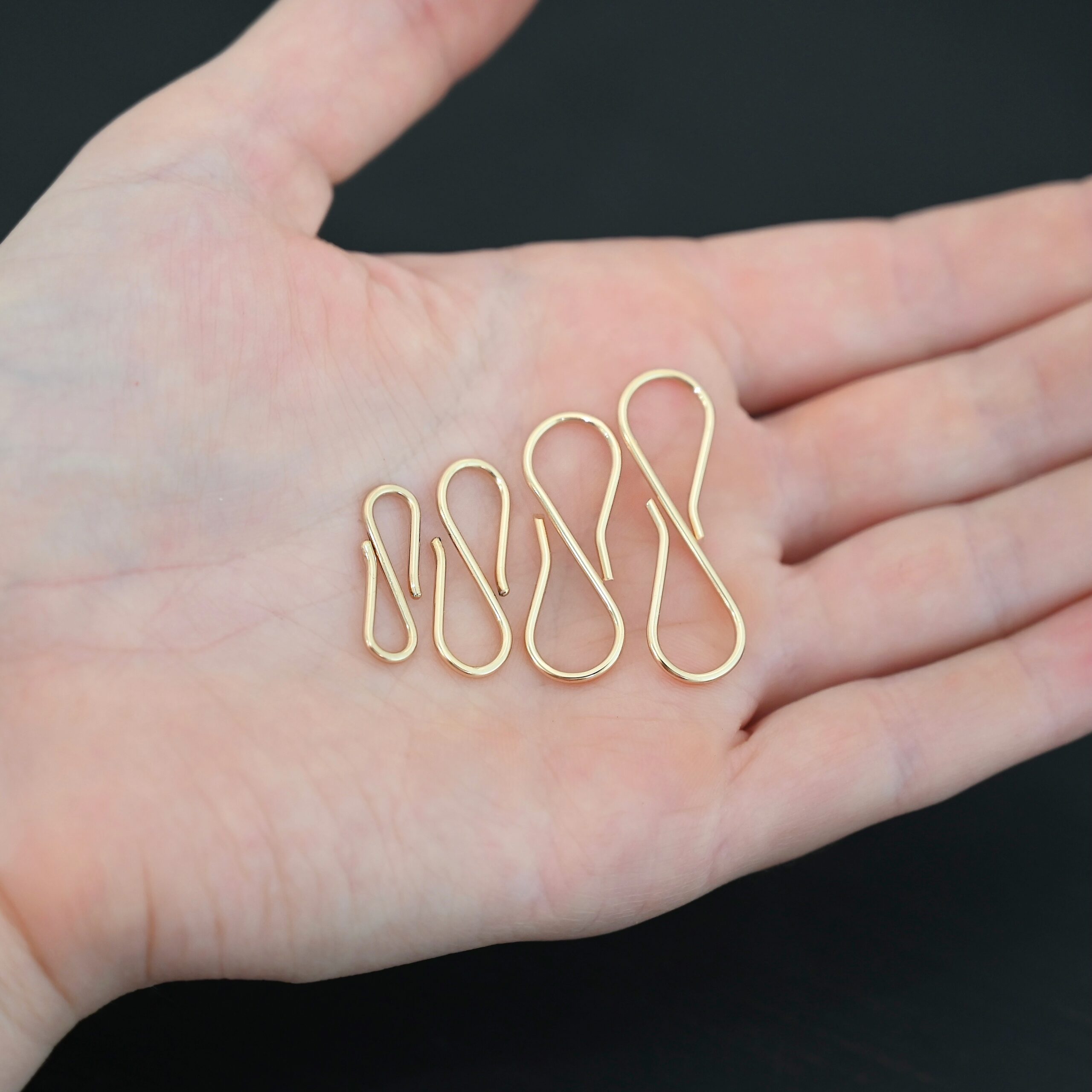 Stella 14k GF S Clasp shown in hand