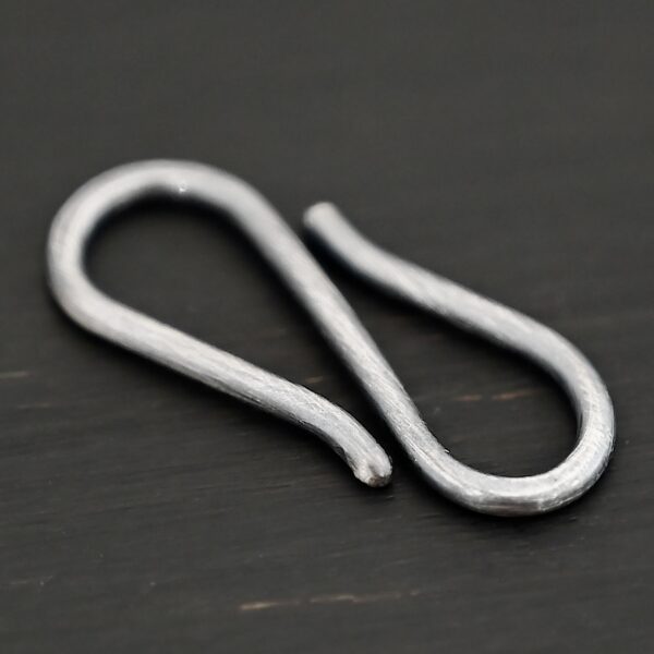 Simon S Clasp - oxidized shown on dark background