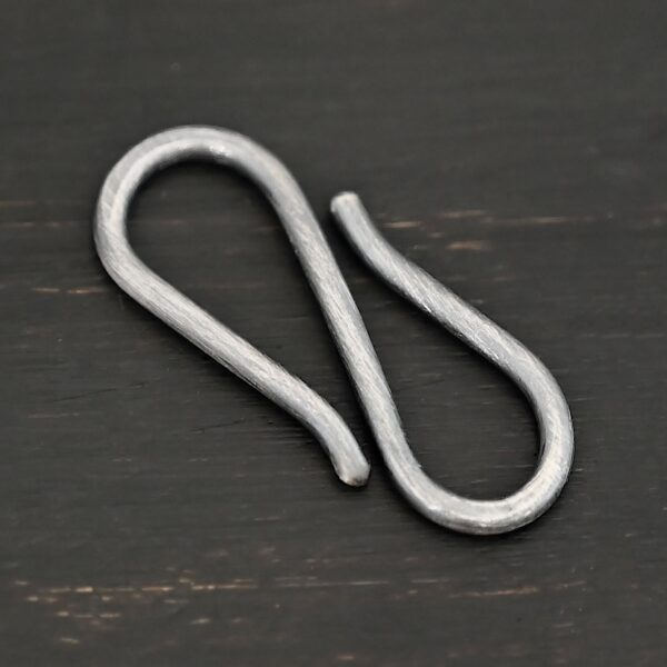 Simon S Clasp - oxidized shown on dark background