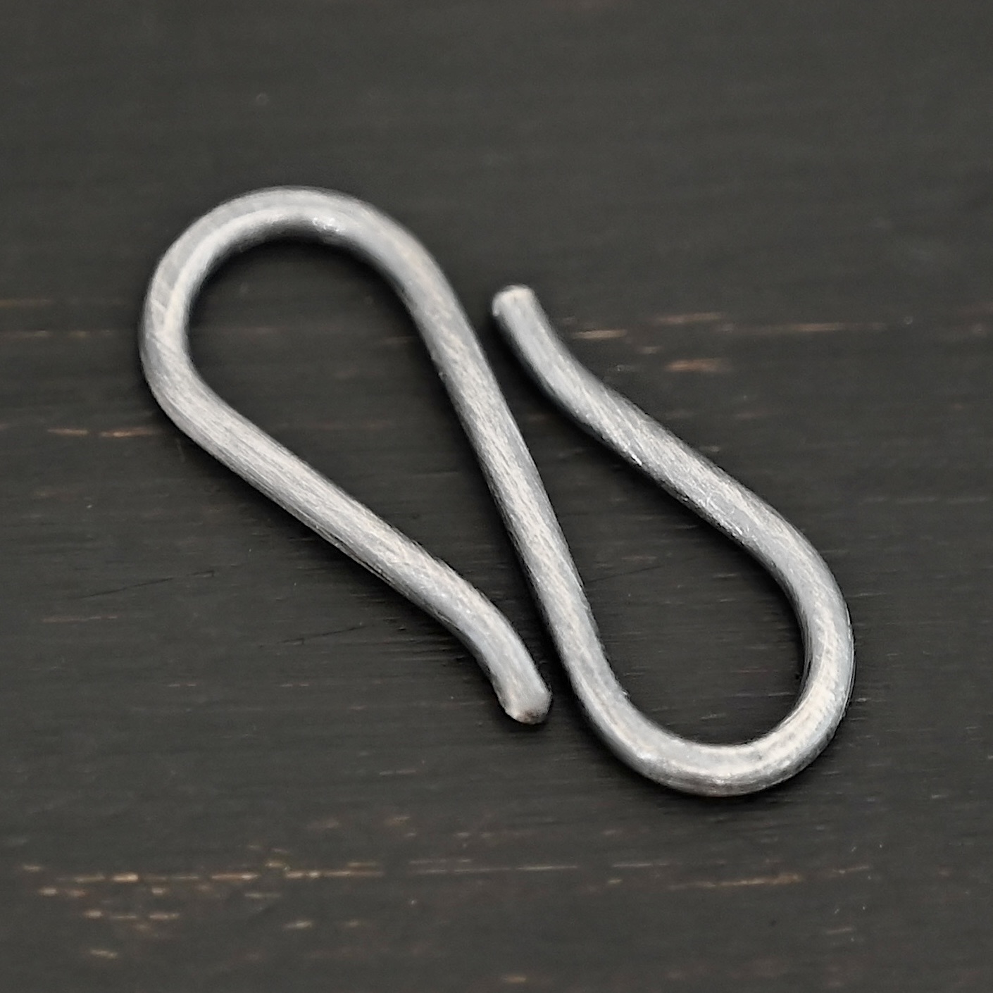 Simon S Clasp - oxidized Simon S Clasp - oxidized shown on dark background