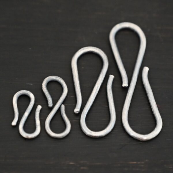Simon S Clasp - oxidized shown on dark background