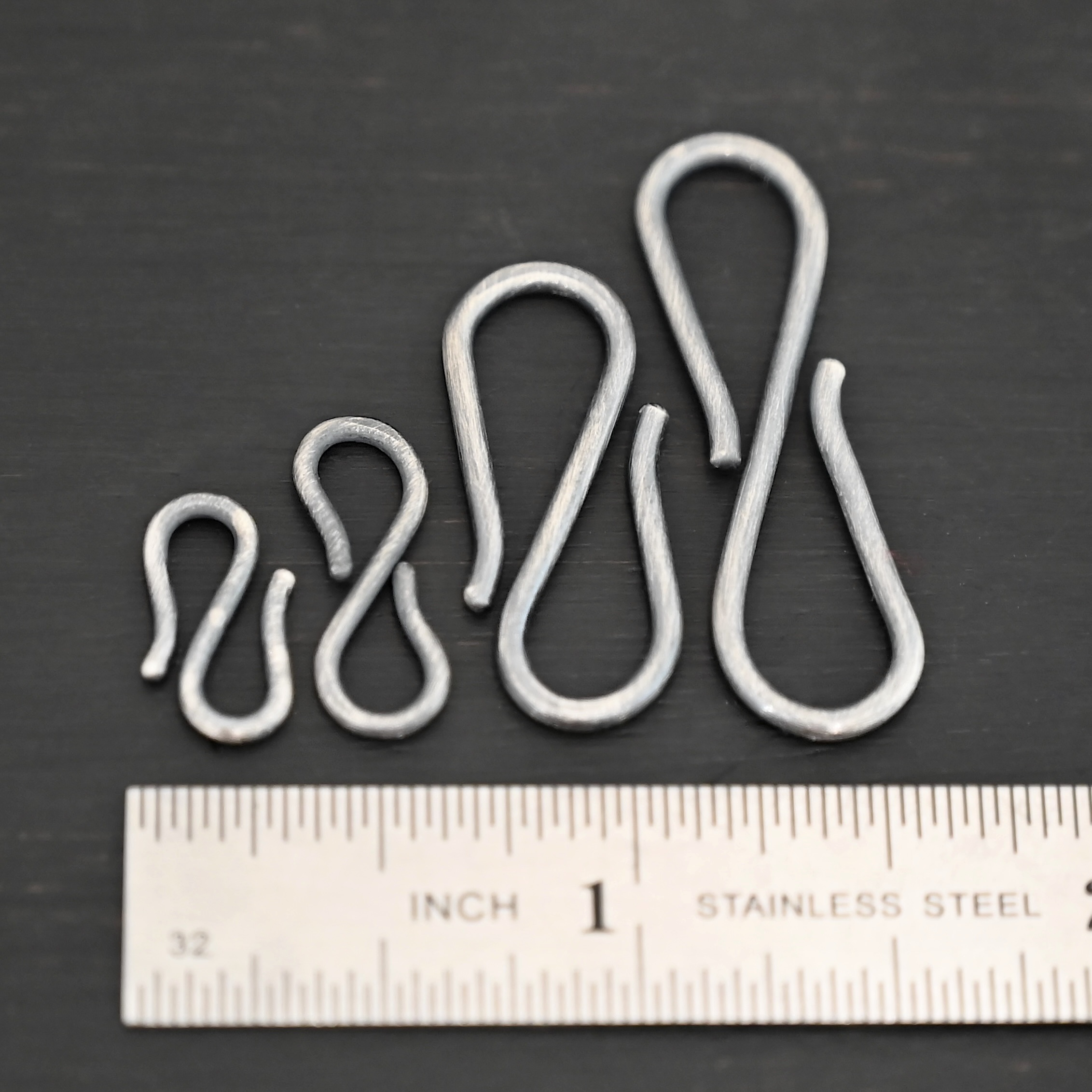 Simon S Clasp - oxidized Simon S Clasp - oxidized shown by ruler