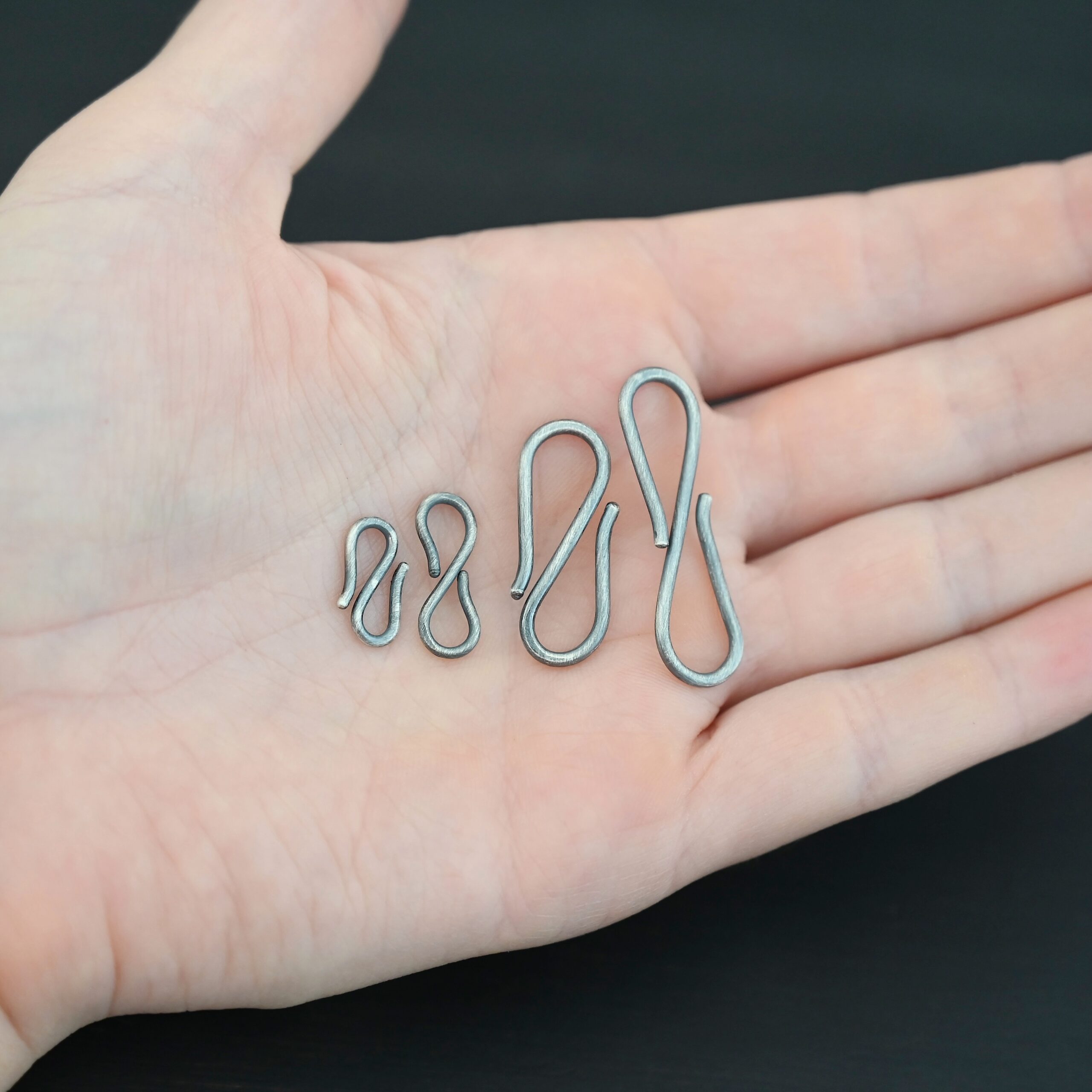 Simon S Clasp - oxidized Simon S Clasp - oxidized shown in hand